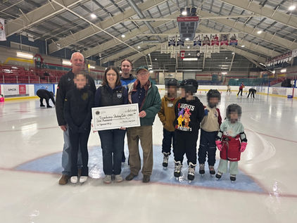 Lions Present $1000 Donation to Tricentarena Skating Club